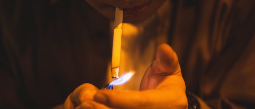 closeup of lighting a cigarette