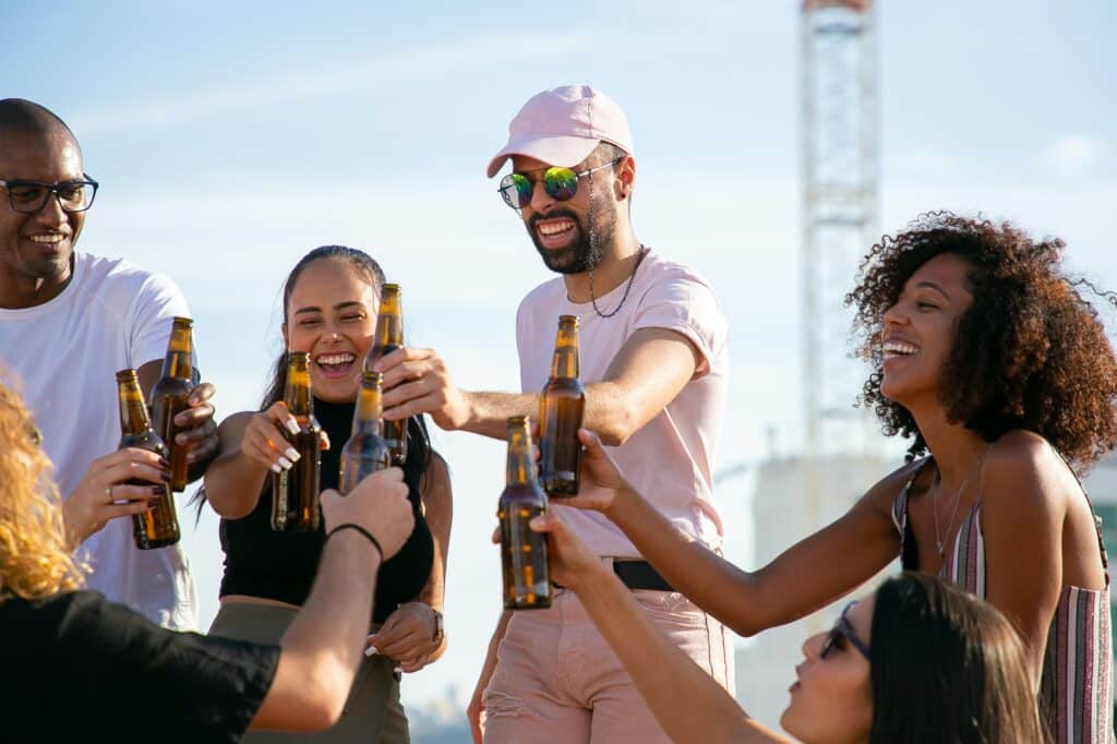 Group cheers with bottles